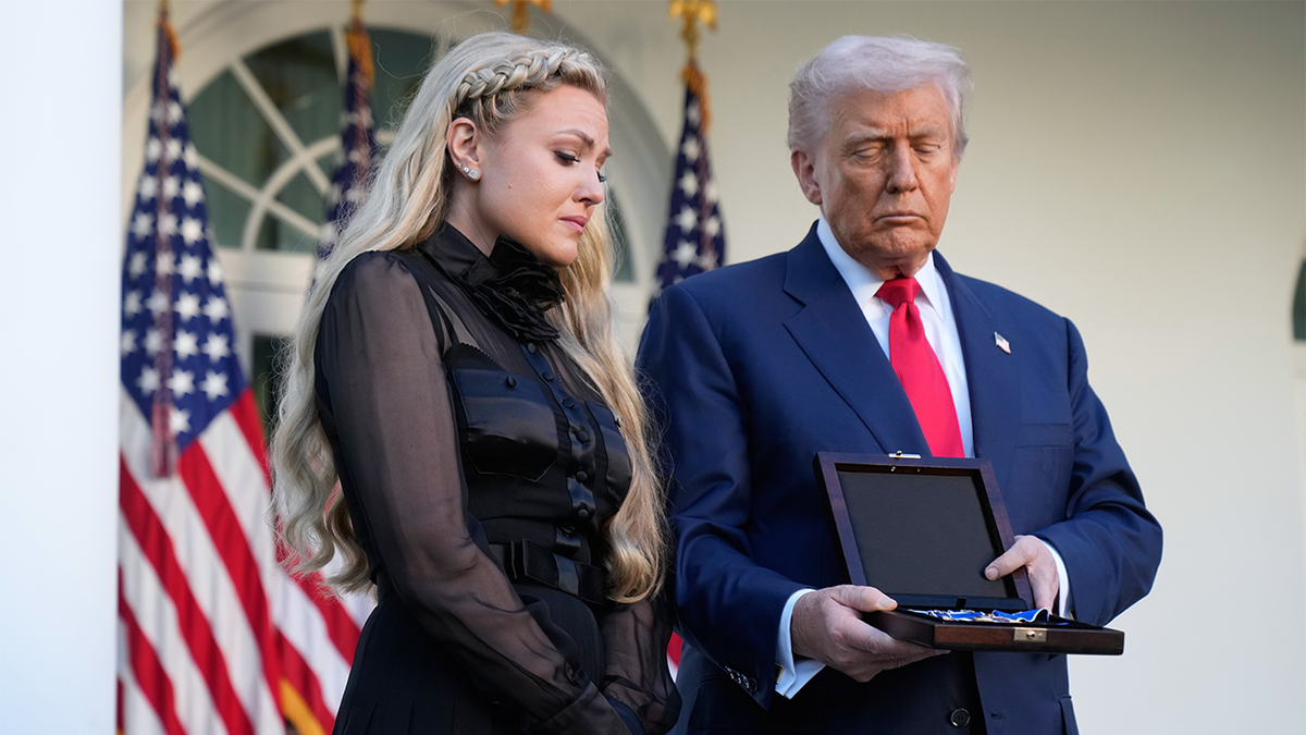 President Donald Trump posthumously awards the Presidential Medal of Freedom to Charlie Kirk, presenting the medal to Erika Kirk